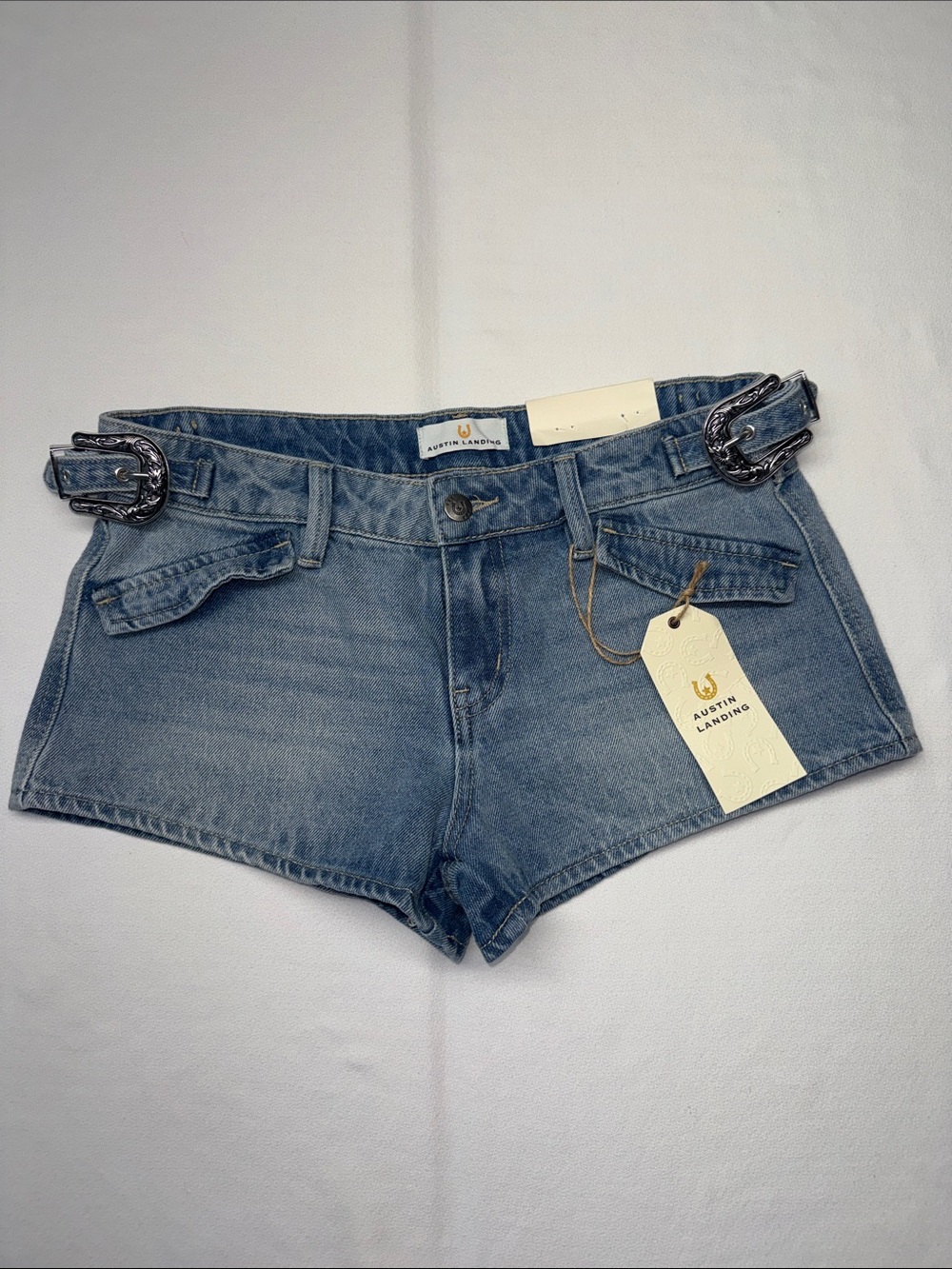 Austin Landing Low Rise Light Blue Denim Jean Shorts with Decorative Buckle